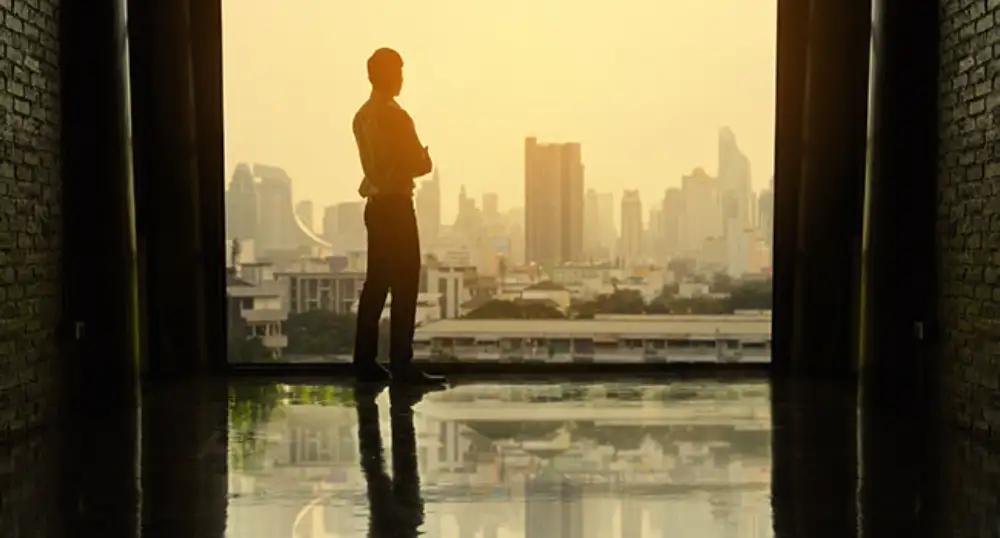Man Looking At City